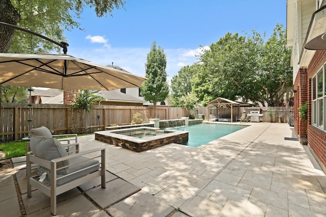 16403 Bogan Flats Ct, Houston, TX 77095 - view of swimming pool featuring a gazebo, a patio, a pool with connected hot tub, and a fenced backyard