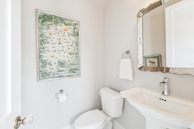928 Robbie St Unit B, Houston, TX 77009 - half bathroom with a sink and toilet