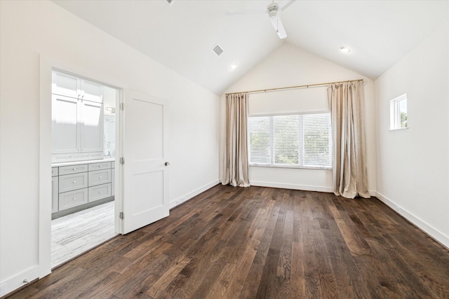 928 Robbie St Unit B, Houston, TX 77009 - unfurnished bedroom featuring vaulted ceiling, dark wood-style flooring, ensuite bath, and a ceiling fan