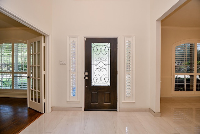 9302 Stone Porch Ln, Houston, TX 77064 - tiled entryway with ornamental molding and a towering ceiling
