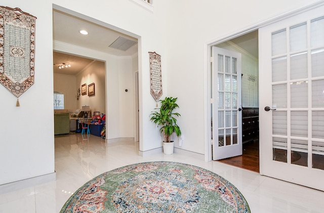 9302 Stone Porch Ln, Houston, TX 77064 - corridor featuring french doors, tile patterned flooring, crown molding, and recessed lighting
