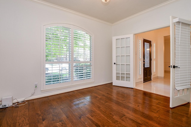 9302 Stone Porch Ln, Houston, TX 77064 - unfurnished room featuring ornamental molding, wood finished floors, and french doors