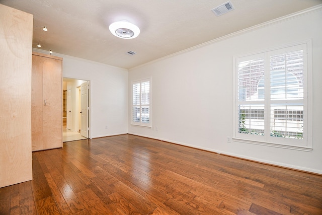 9302 Stone Porch Ln, Houston, TX 77064 - unfurnished room featuring ornamental molding, hardwood / wood-style flooring, and healthy amount of natural light