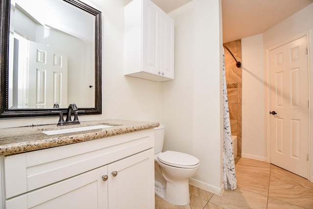 9302 Stone Porch Ln, Houston, TX 77064 - bathroom featuring a shower with curtain, vanity, and tile patterned floors