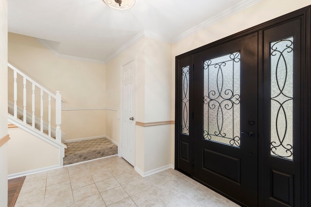 34 Sweetdream Pl, The Woodlands, TX 77381 - foyer entrance with stairs, light tile patterned floors, light carpet, and crown molding
