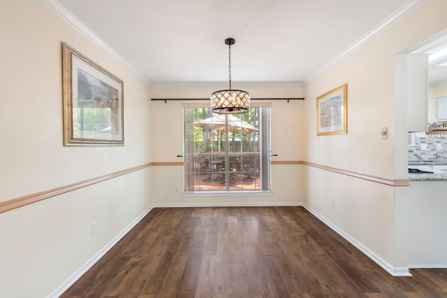 34 Sweetdream Pl, The Woodlands, TX 77381 - unfurnished dining area with wood finished floors, a chandelier, and crown molding