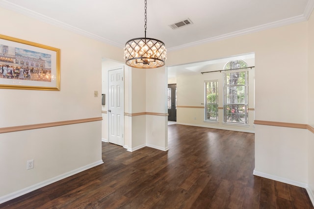 34 Sweetdream Pl, The Woodlands, TX 77381 - spare room featuring a chandelier, dark wood-type flooring, and crown molding