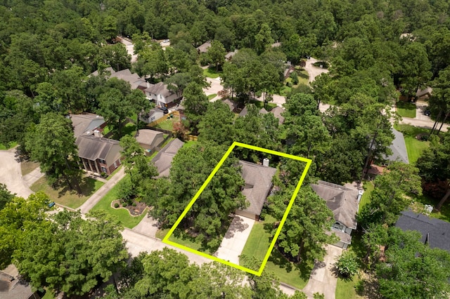 34 Sweetdream Pl, The Woodlands, TX 77381 - aerial perspective of suburban area with property boundaries highlighted and a forest