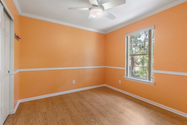 34 Sweetdream Pl, The Woodlands, TX 77381 - unfurnished room featuring wood finished floors, ceiling fan, and crown molding