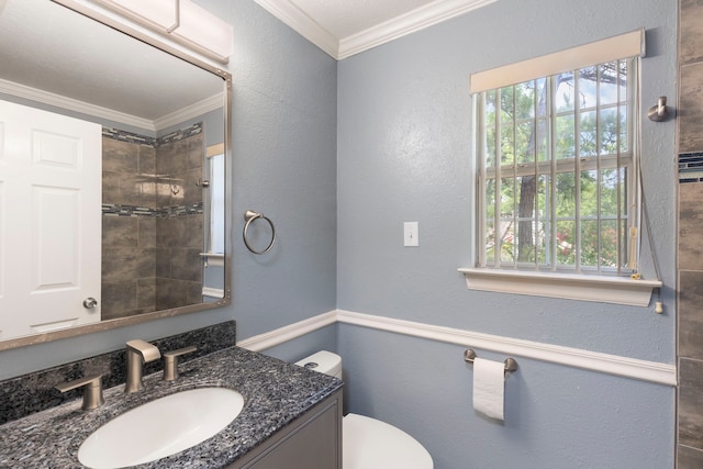 34 Sweetdream Pl, The Woodlands, TX 77381 - bathroom featuring ornamental molding, plenty of natural light, vanity, and tiled shower