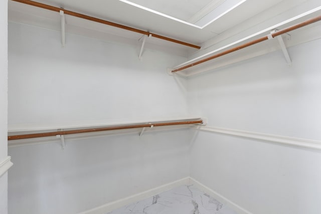 34 Sweetdream Pl, The Woodlands, TX 77381 - spacious closet featuring marble look tile flooring