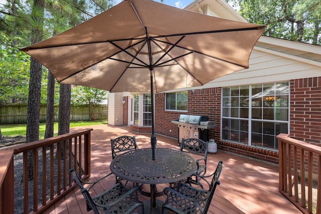 34 Sweetdream Pl, The Woodlands, TX 77381 - wooden deck with a grill