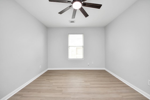 7407 Rustic Chase Dr, Richmond, TX 77407 - empty room with ceiling fan and light wood-style flooring