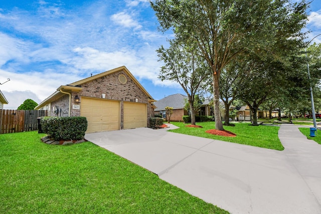 7407 Rustic Chase Dr, Richmond, TX 77407 - view of front of house featuring concrete driveway, an attached garage, and brick siding