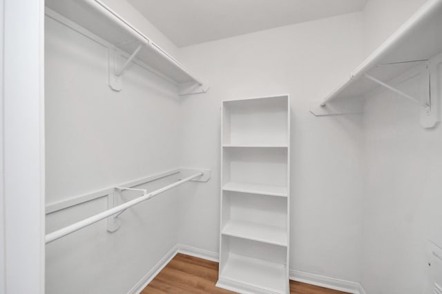 7407 Rustic Chase Dr, Richmond, TX 77407 - spacious closet featuring wood finished floors