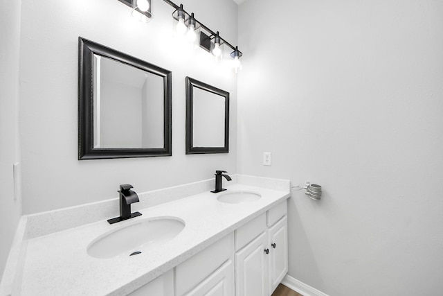 7407 Rustic Chase Dr, Richmond, TX 77407 - bathroom featuring double vanity