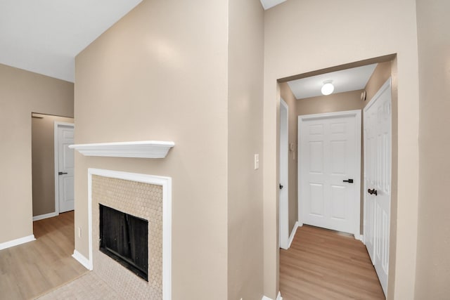 7407 Rustic Chase Dr, Richmond, TX 77407 - corridor with light wood-type flooring and baseboards