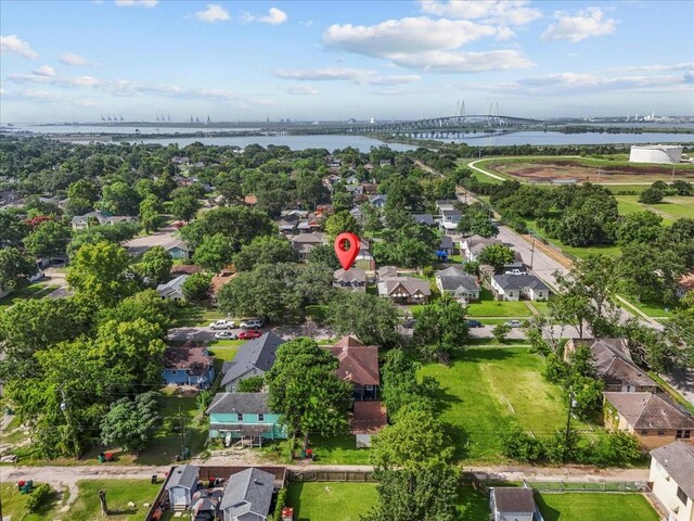 3217 Michigan St, Baytown, TX 77520 - aerial perspective of suburban area with a notable bridge and a nearby body of water