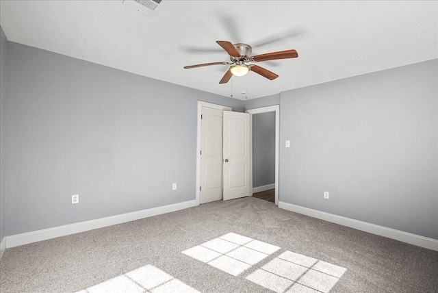 3217 Michigan St, Baytown, TX 77520 - unfurnished bedroom with carpet floors and ceiling fan