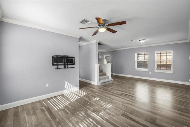3217 Michigan St, Baytown, TX 77520 - unfurnished room with ornamental molding, ceiling fan, stairway, and wood finished floors