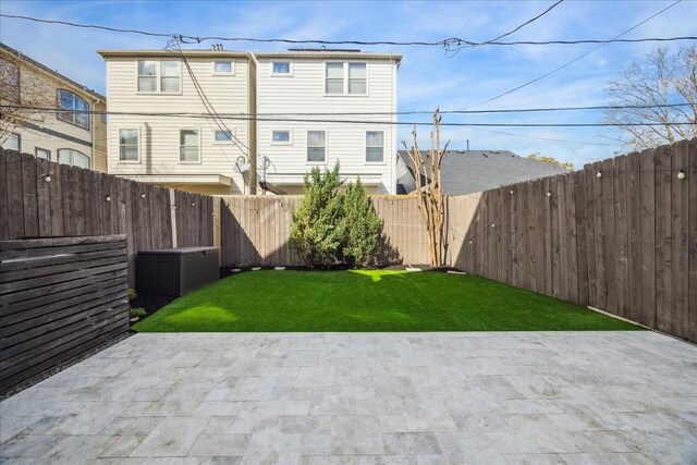 4410 Floyd St Unit B, Houston, TX 77007 - back of property with a patio and a fenced backyard