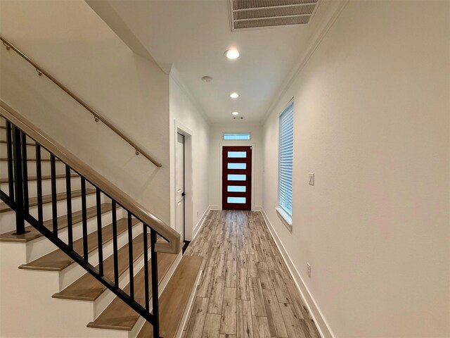 6635 Tc Jester Blvd Unit A, Houston, TX 77007 - doorway featuring wood finished floors, recessed lighting, stairs, and ornamental molding