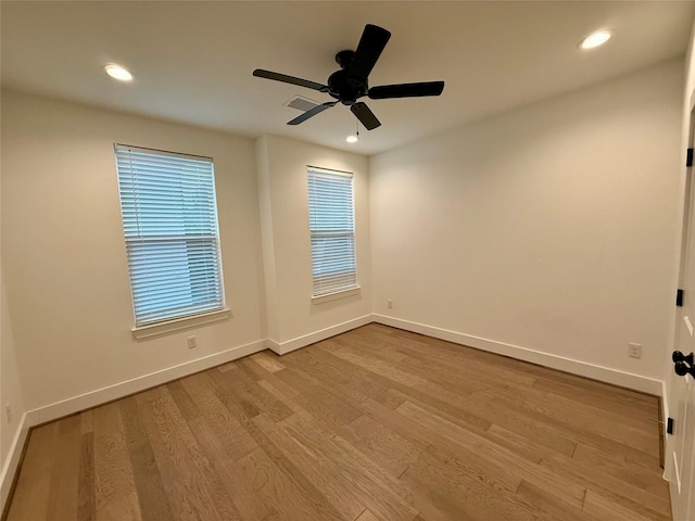 6635 Tc Jester Blvd Unit A, Houston, TX 77007 - spare room featuring wood finished floors, a ceiling fan, and recessed lighting