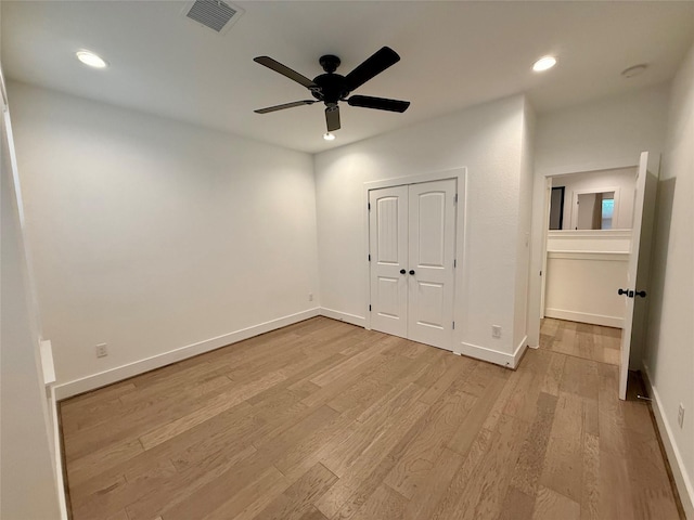 6635 Tc Jester Blvd Unit A, Houston, TX 77007 - unfurnished bedroom with light wood-type flooring, recessed lighting, a ceiling fan, and a closet