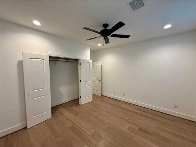 6635 Tc Jester Blvd Unit A, Houston, TX 77007 - unfurnished bedroom with light wood-type flooring, recessed lighting, a ceiling fan, and a closet