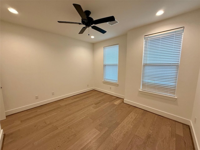 6635 Tc Jester Blvd Unit A, Houston, TX 77007 - unfurnished room featuring light wood finished floors, ceiling fan, and recessed lighting