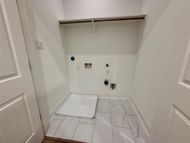6635 Tc Jester Blvd Unit A, Houston, TX 77007 - laundry area with electric dryer hookup, hookup for a washing machine, marble look tile flooring, and hookup for a gas dryer