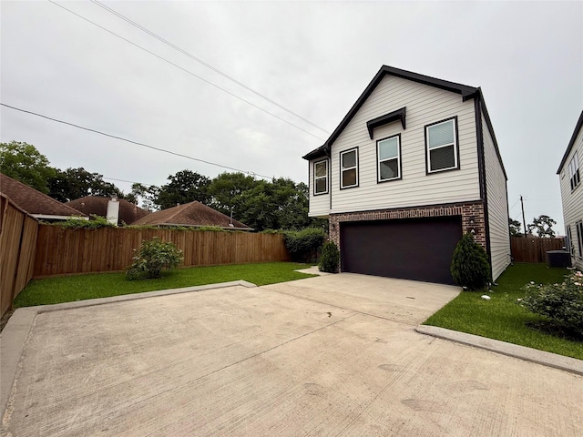 6635 Tc Jester Blvd Unit A, Houston, TX 77007 - view of property exterior featuring a garage, concrete driveway, and brick siding