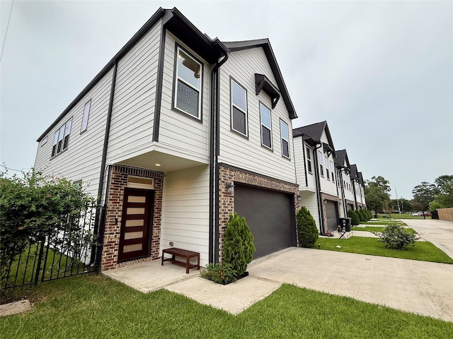 6635 Tc Jester Blvd Unit A, Houston, TX 77007 - multi unit property with a garage, brick siding, and driveway