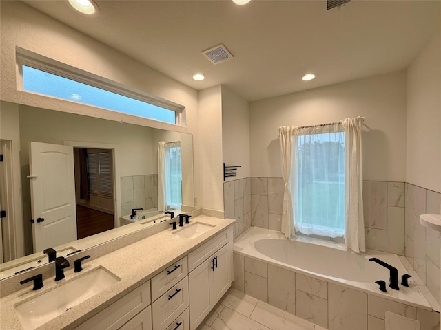 6635 Tc Jester Blvd Unit A, Houston, TX 77007 - full bath with double vanity, a bath, and recessed lighting