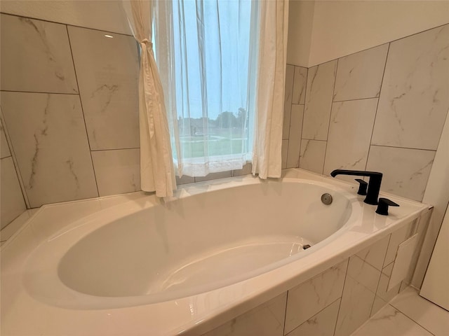 6635 Tc Jester Blvd Unit A, Houston, TX 77007 - bathroom featuring a bath and tile walls
