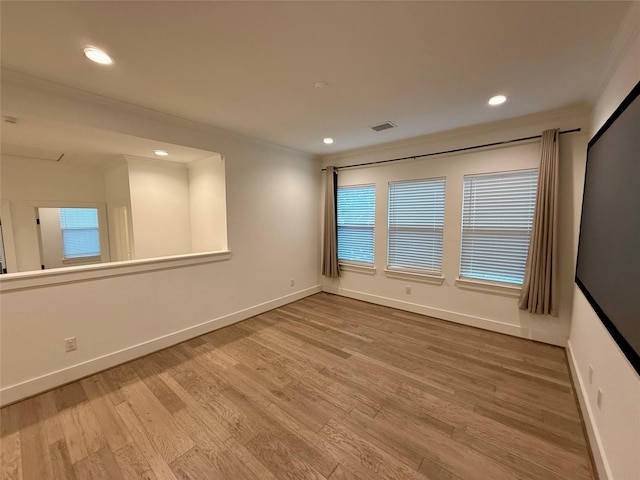 6635 Tc Jester Blvd Unit A, Houston, TX 77007 - unfurnished room with crown molding, wood finished floors, and recessed lighting
