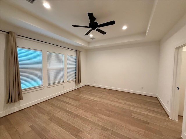 6635 Tc Jester Blvd Unit A, Houston, TX 77007 - spare room with a raised ceiling, light wood finished floors, ceiling fan, and recessed lighting