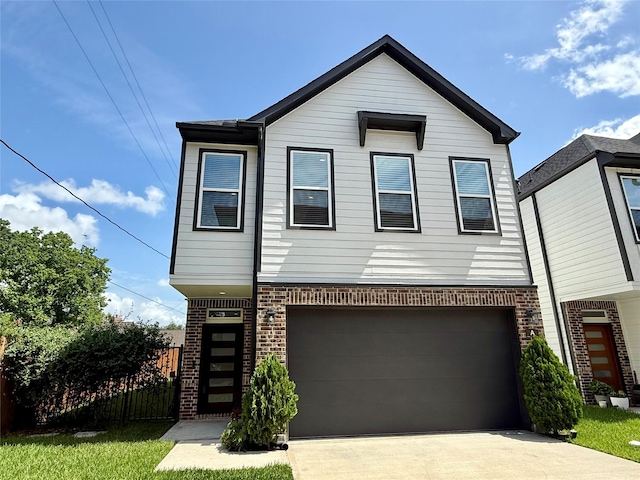 6635 Tc Jester Blvd Unit A, Houston, TX 77007 - view of front of house featuring brick siding, an attached garage, and concrete driveway