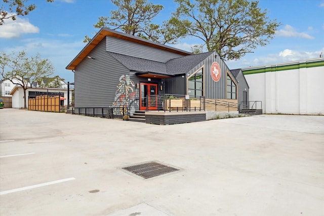 811 Thornton Rd Unit B, Houston, TX 77018 - view of property exterior featuring roof with shingles