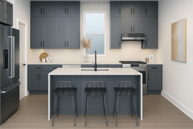 811 Thornton Rd Unit B, Houston, TX 77018 - kitchen with electric stove, high end refrigerator, under cabinet range hood, light wood-style floors, and a kitchen breakfast bar