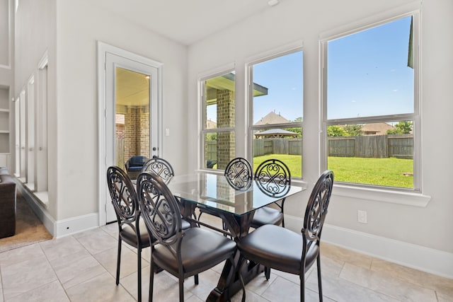 16715 Bark Cabin Dr, Humble, TX 77346 - dining area featuring plenty of natural light and light tile patterned floors