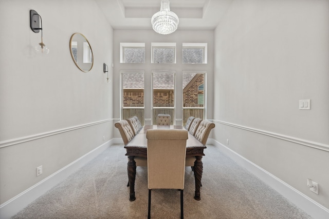 16715 Bark Cabin Dr, Humble, TX 77346 - carpeted dining space featuring a chandelier and a raised ceiling