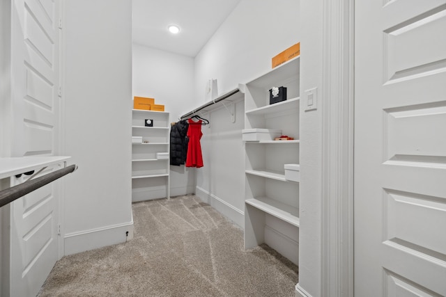 16715 Bark Cabin Dr, Humble, TX 77346 - walk in closet with light colored carpet