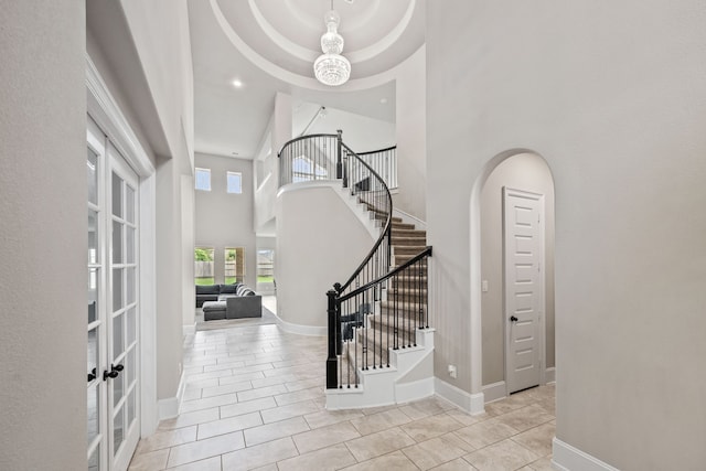 16715 Bark Cabin Dr, Humble, TX 77346 - tiled entrance foyer with a high ceiling, stairs, recessed lighting, and french doors