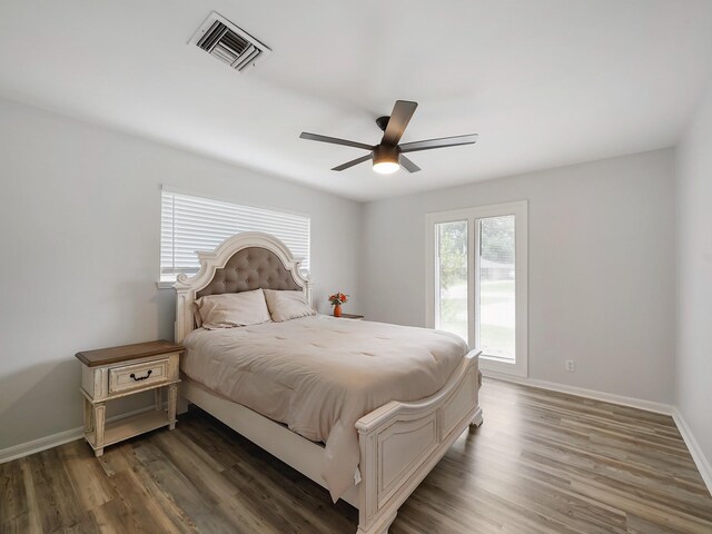 19518 Barwick Dr, Spring, TX 77373 - bedroom featuring wood finished floors and a ceiling fan