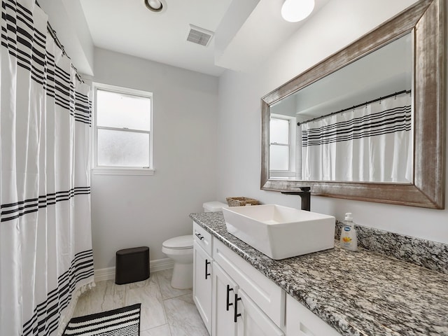 19518 Barwick Dr, Spring, TX 77373 - full bath featuring vanity, marble look tile flooring, and a shower with shower curtain
