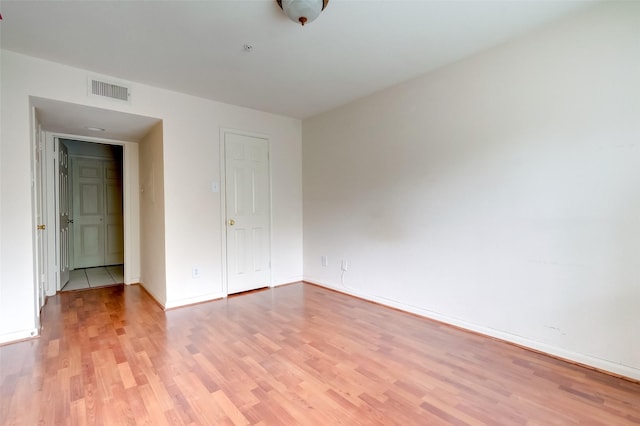 3231 Allen Pkwy Unit 1306, Houston, TX 77019 - unfurnished bedroom with light wood finished floors and baseboards