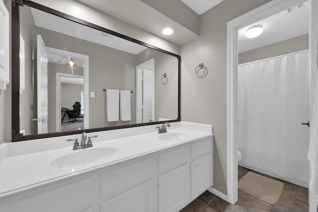 35 S Floral Leaf Cir, The Woodlands, TX 77381 - bathroom featuring double vanity and a shower with curtain