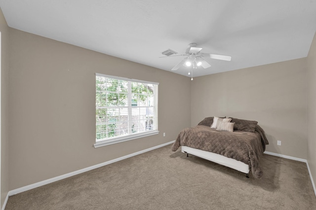 35 S Floral Leaf Cir, The Woodlands, TX 77381 - carpeted bedroom featuring baseboards and a ceiling fan