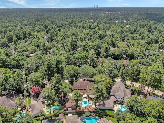 35 S Floral Leaf Cir, The Woodlands, TX 77381 - bird's eye view of a forest and a pool